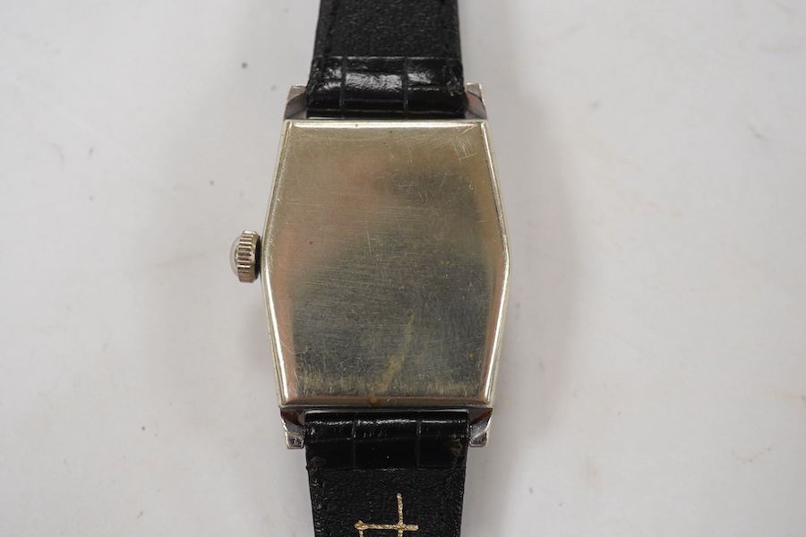 A gentleman's mid 20th century stainless steel Rolex manual wind wrist watch, with Arabic dial and Rolex and Enivar movement, case diameter 24mm, on a later associated leather strap. Condition - poor to fair